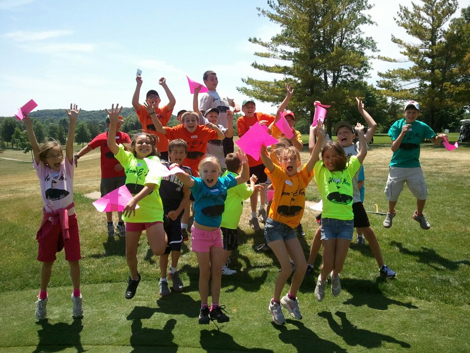children pose at junior golf camp